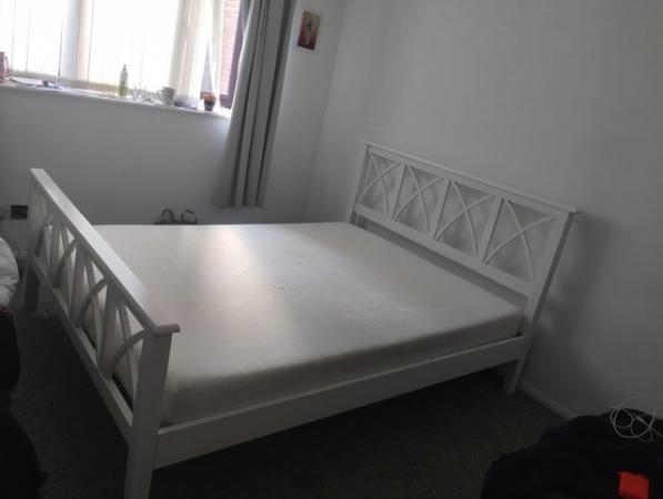Image 1 of King size bed and mattress. Good condition and comfortable.