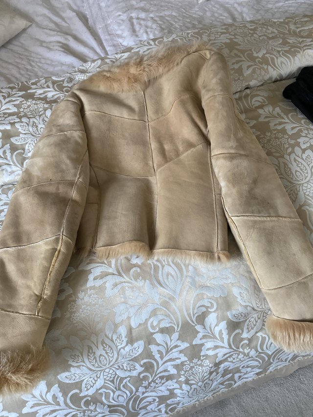 Preview of the first image of real sheepskin jacket beige size 12.