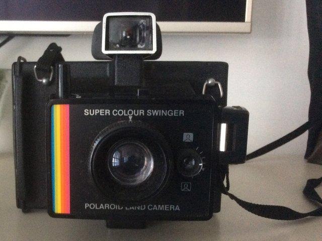 Preview of the first image of 1970’s Polaroid Super Colour Swinger Land camera.