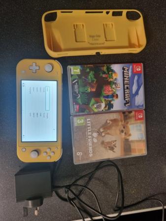 Image 2 of Yellow nintendo switch lite and games