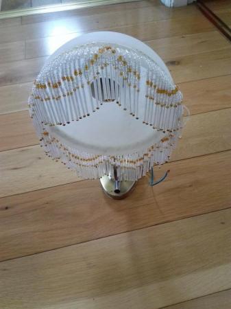 Image 1 of Wall light with glass shade and beaded fringe