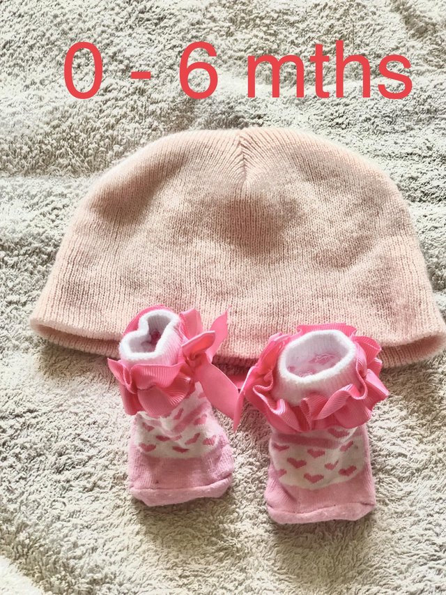 Preview of the first image of Pink hat with pink socks.