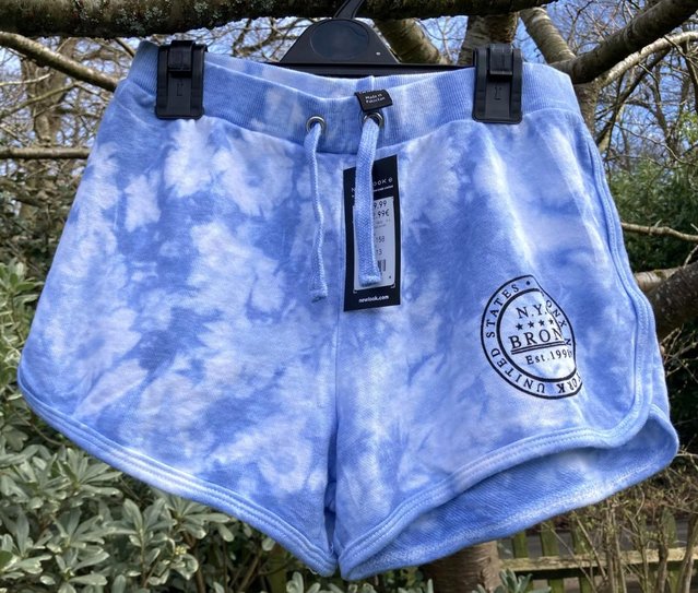Preview of the first image of Girl's Blue/White NYC Bronx Slogan Runner Shorts 12-13 yrs.