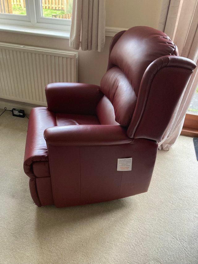 Preview of the first image of HSL electric Riser-recliner chair, hardly used. Burgundy-red.