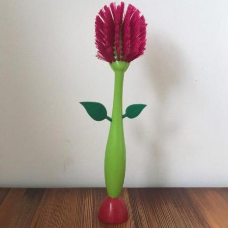 Image 1 of Unused Vigar washing up brush, green/pink. Flower missing.