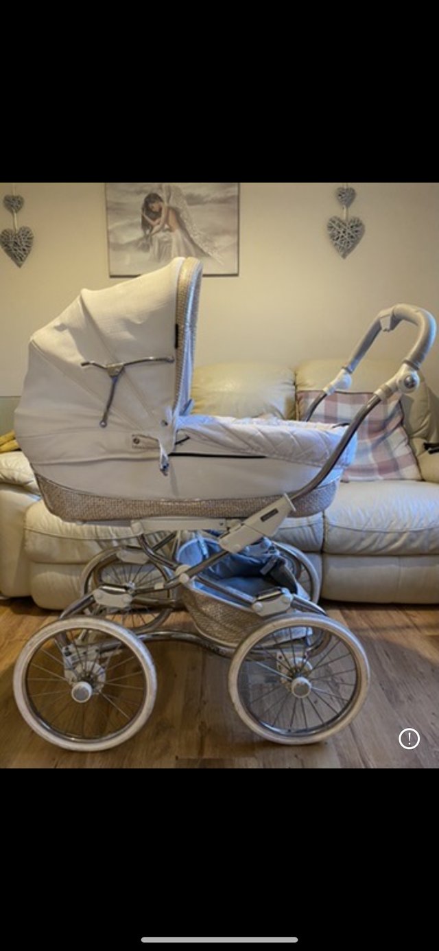 Preview of the first image of Bebecar stylo pram , cream with gold glitter trim.