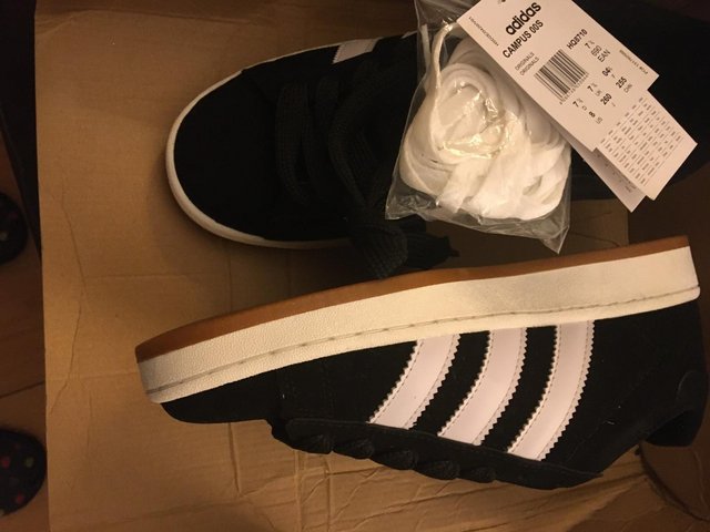 Preview of the first image of Brand New pair of ADIDAS Black and White Trainers.