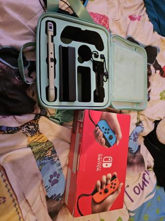 Image 2 of Nintendo switch with accessories