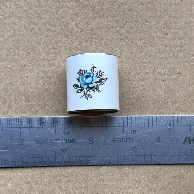 Preview of the first image of Enamel hand painted scarf ring 1970’s vgc.