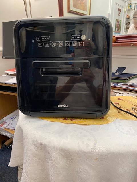 Preview of the first image of Breville Halo Rotisserie Air Fryer oven used few times only.