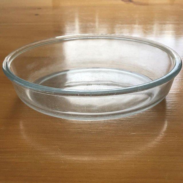 Preview of the first image of Pyrex clear oval dish, scratched..