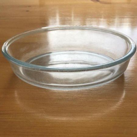 Image 1 of Pyrex clear oval dish, scratched.