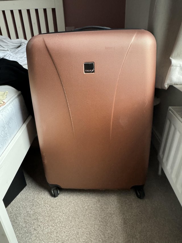 Preview of the first image of Tripp copper/rose gold suitcase.