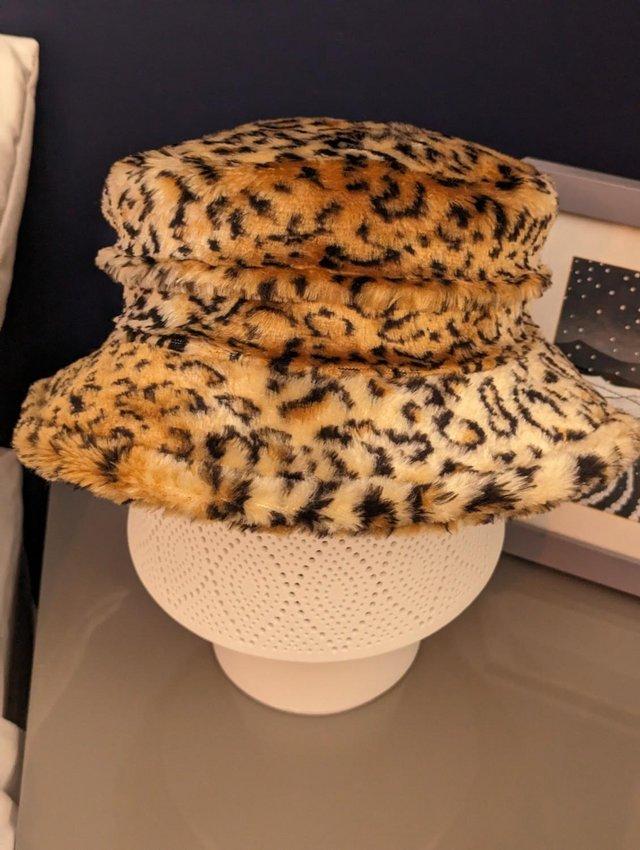 Preview of the first image of Leopard Print Faux Fur Hat, Handmade, Unworn.