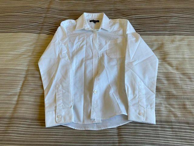 Preview of the first image of Girls White Long Sleeved School Shirt.