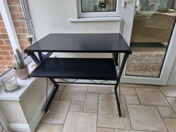 Image 1 of Compact black wood effect desk with sliding keyboard she