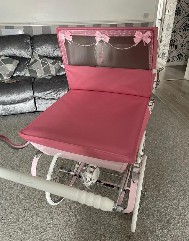 Preview of the first image of Pink Balmoral silver cross couch built pram.
