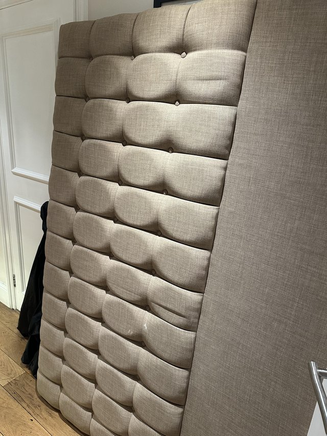 Preview of the first image of Queen size head board excellent condition neutral colour..