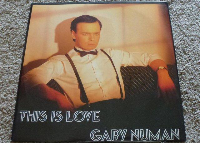Preview of the first image of Gary Numan, This Is Love, 12 inch vinyl single. New.