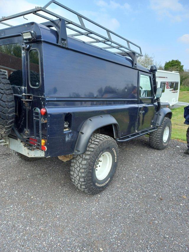 Preview of the first image of Landrover defender solid back 110 in dark blue.