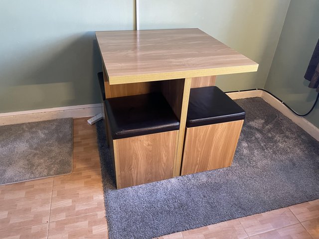 Preview of the first image of Space saver table and stools with storage.