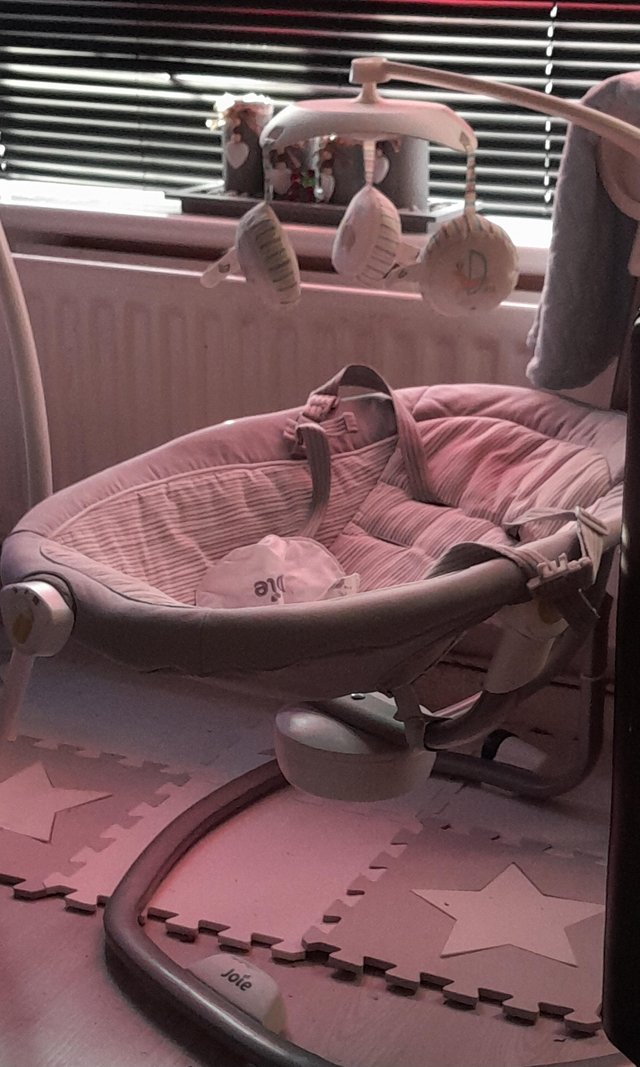 Preview of the first image of moses basket and stand and electronic swin.