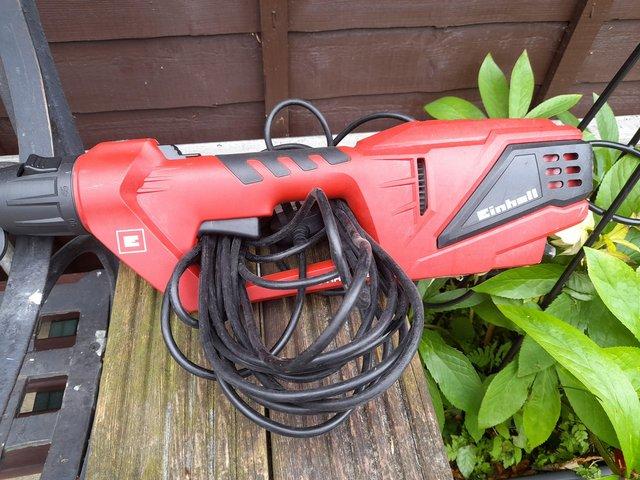 Preview of the first image of Einhall extendable electric hedge trimmer.