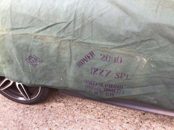 Image 3 of Car cover as Good as new heavy duty on the side it says ROVE