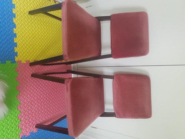 Preview of the first image of 2 rose pink padded Occasional/ dinning Chairs.