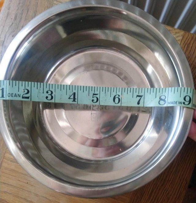 Preview of the first image of Stainless Steel Dog Bowl 9 inches across.
