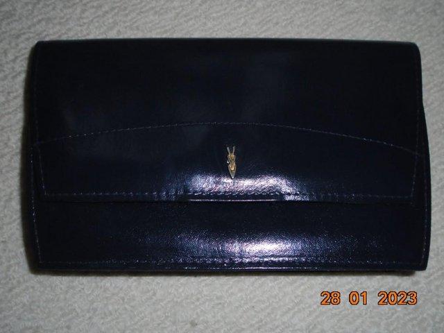 Preview of the first image of Salisbury's Navy Leather Clutch Handbag.