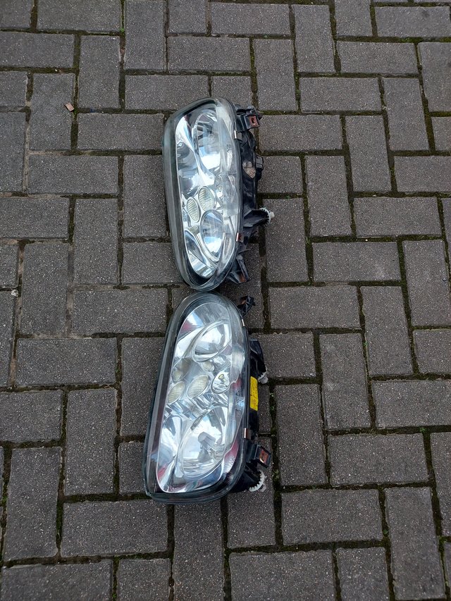 Preview of the first image of MK3 VW GOLF GTI CHROME HEADLIGHTS.