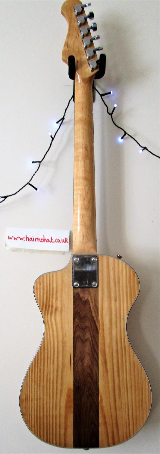 Preview of the first image of Unique electric solid pine body guitar.