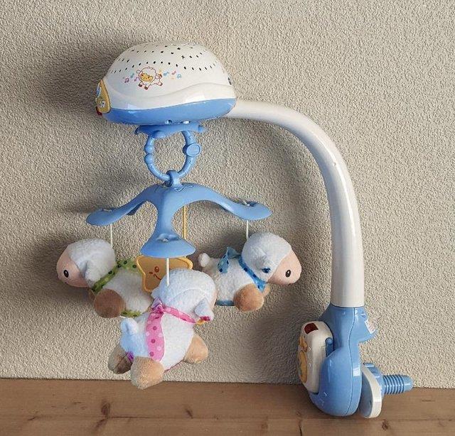 Preview of the first image of Vtech Lullaby Lambs Remote Control Cot Mobile.