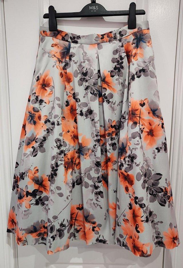 Preview of the first image of New with Tags Women's M&Co Boutique Skirt Size 12.