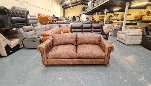 Preview of the first image of Vintage brown leather 3 seater chesterfield sofa.