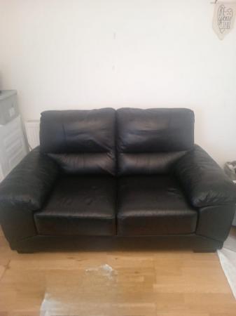 Image 1 of Black leather sofa 2 seater
