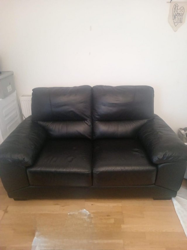 Preview of the first image of Black leather sofa 2 seater.