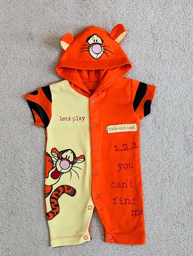 Preview of the first image of Disney Tiger hooded Short Sleeve Romper, Baby up to 4.5 kg.