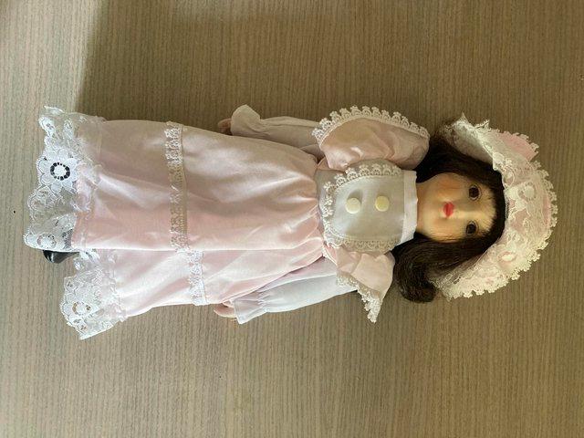 Preview of the first image of Collector's doll with Ceramic head.