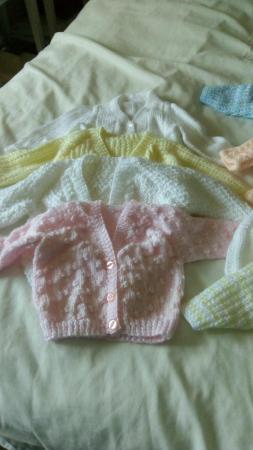 Image 1 of Baby Cardigans Hand Knitted proceeds to St Peters Hospice
