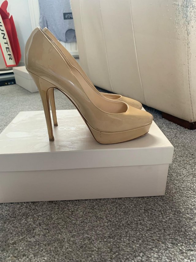 Preview of the first image of Patent nude heels size 5.
