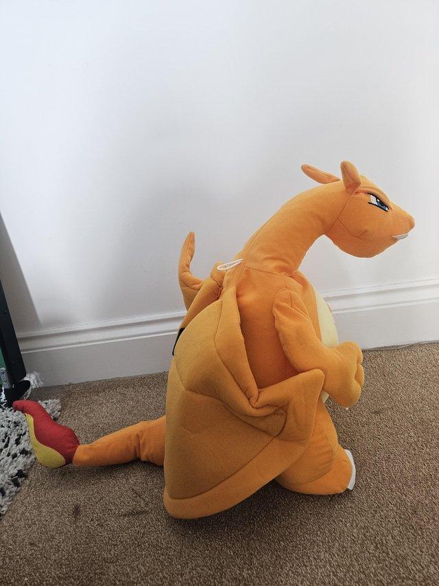 Preview of the first image of POKEMON Charizard 20"plush.