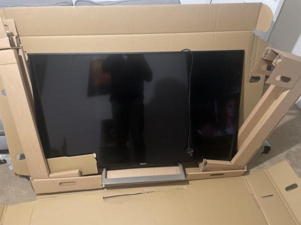 Image 1 of Sony tv 55” with sound bar and all remotes
