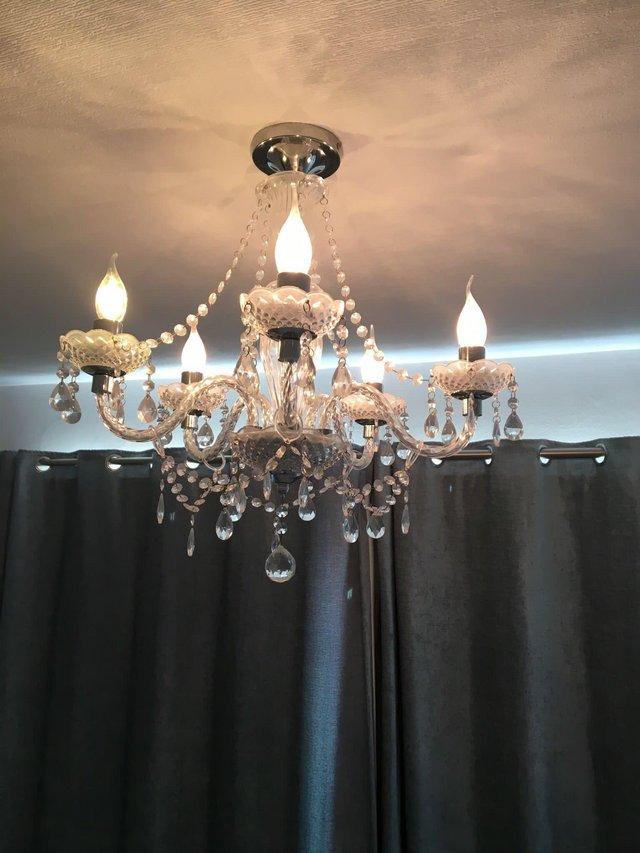 Preview of the first image of 5 arm crystal effect chandelier by Maison.