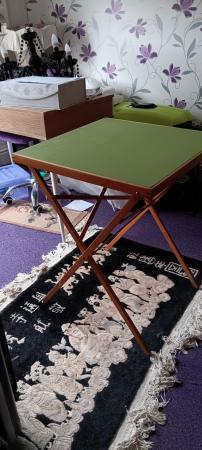 Image 1 of Folding card table with green top.