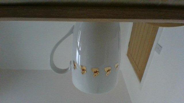 Preview of the first image of Lindt Chocolate Gold Bunny Mug (Rare).