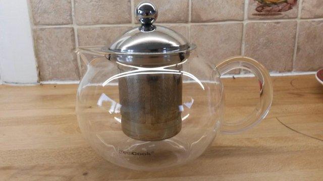 Preview of the first image of Glass Tea Pot complete with infuser and lid.