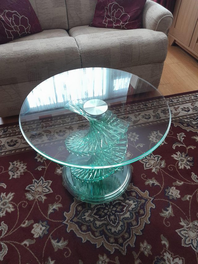 Preview of the first image of Solid glass side table with swirl glass base.