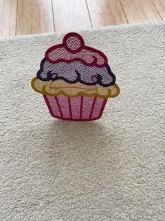 Preview of the first image of Earrings stand in the shape of a Cupcake.